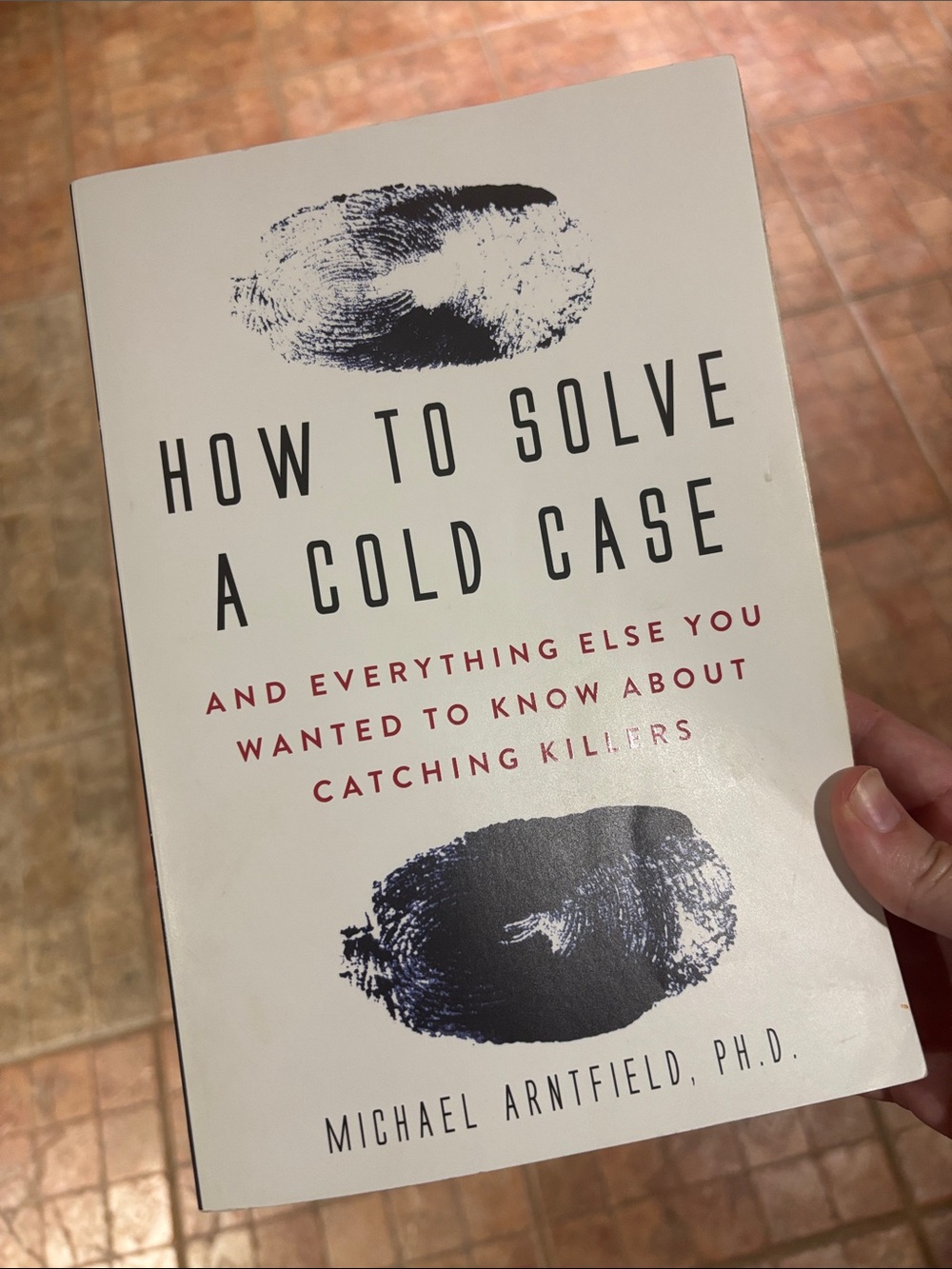 How to Solve a Cold Case by Michael Arntfield paperback book